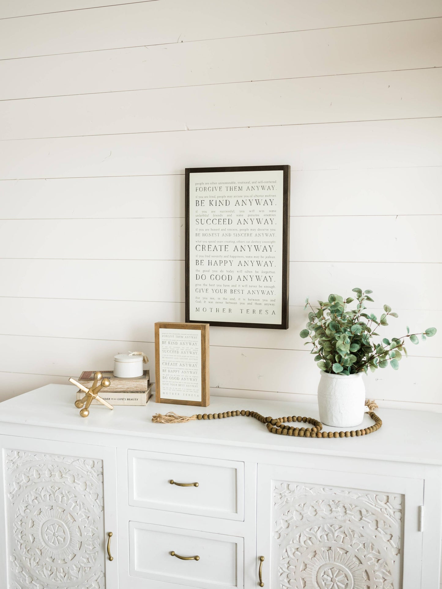 Love them Anyway | Mother Teresa | Wall Art: Black-White Text / Light Brown Frame / 16 inches x 24 inches