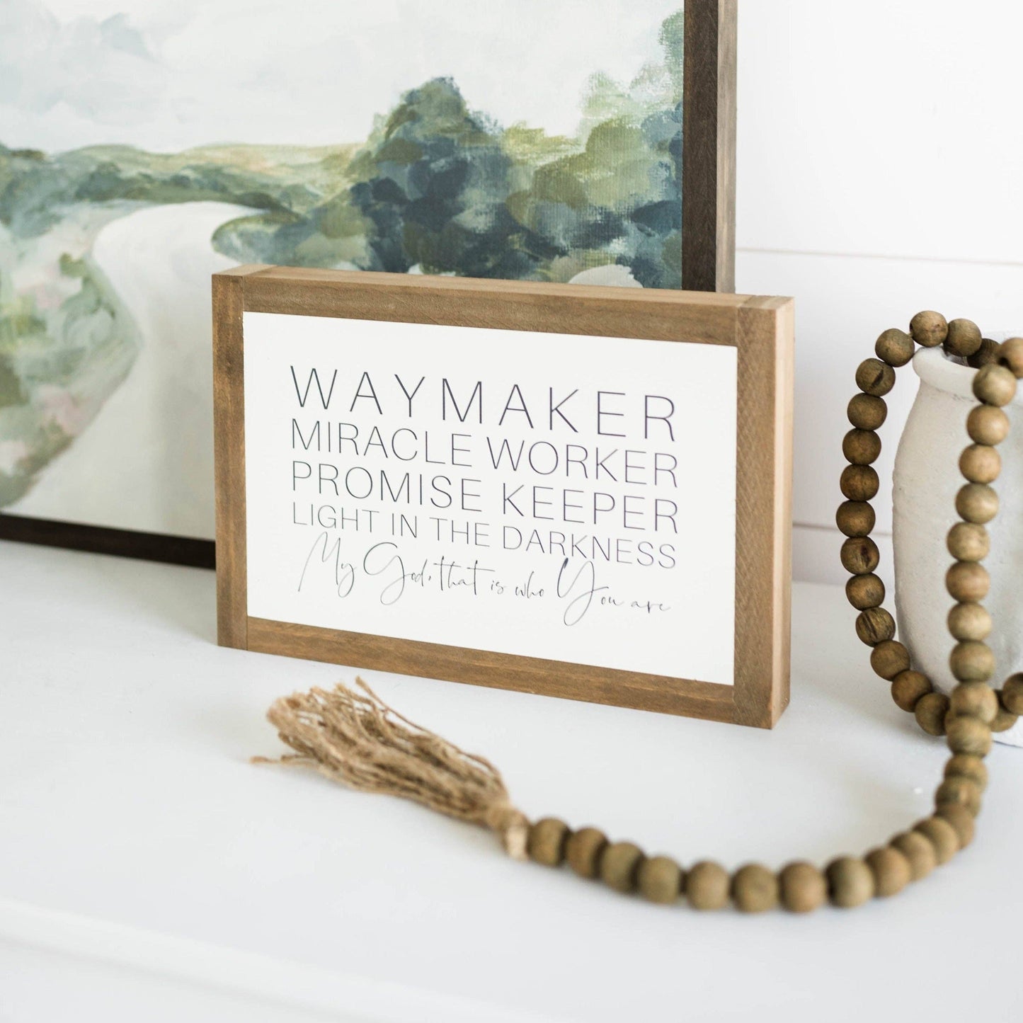 Waymaker | Wall Art: Soft White-Black Text / Light Brown Frame / 24 inches x 16 inches