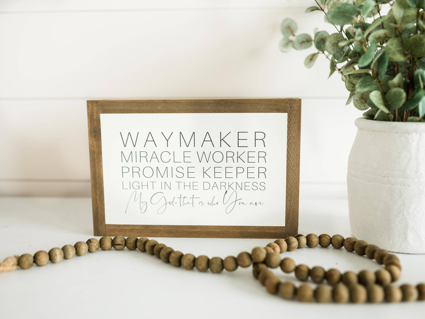 Waymaker | Wall Art: Soft White-Black Text / Light Brown Frame / 24 inches x 16 inches