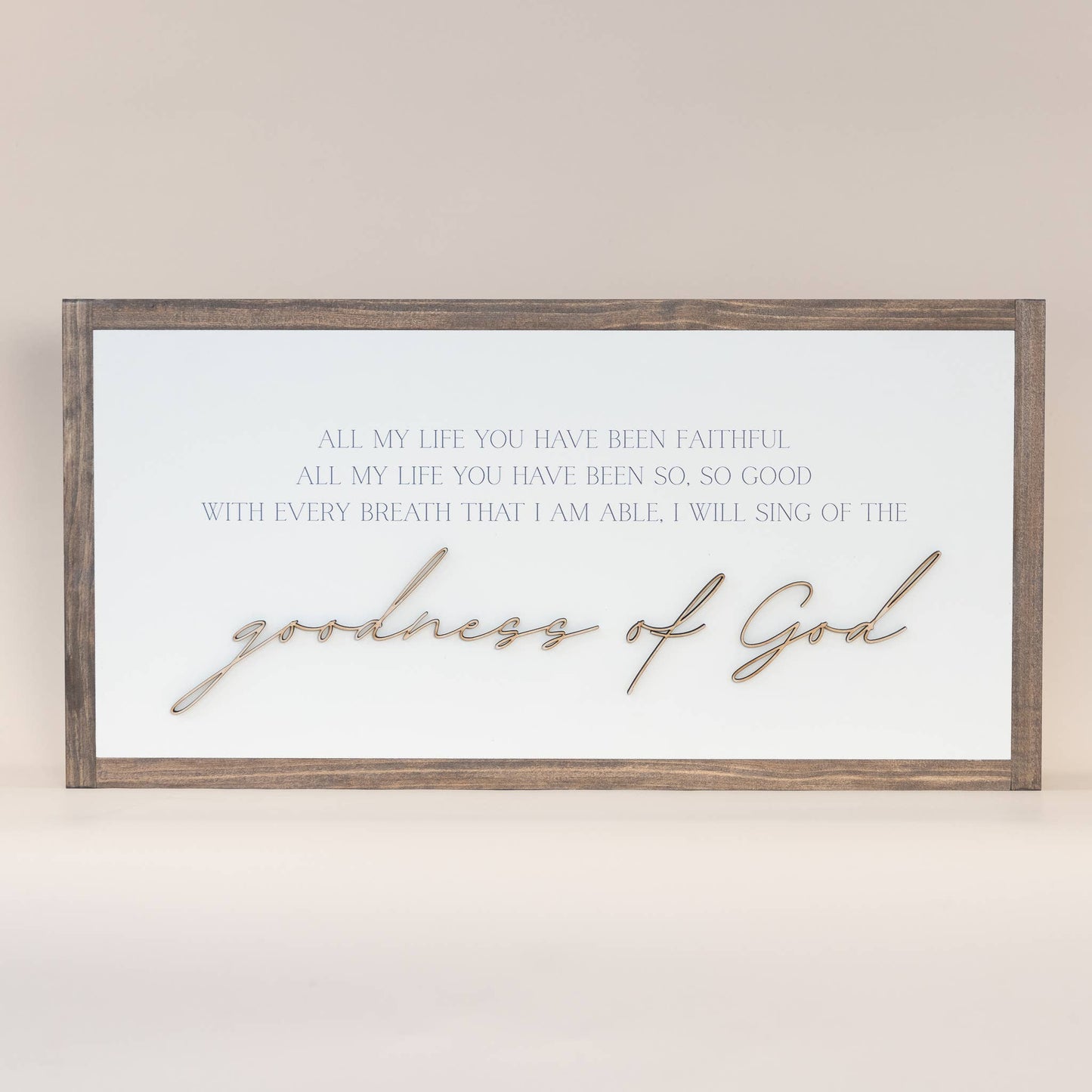 Goodness of God: Soft White-Black Text / Light Brown Frame / 45 inches by 23 inches