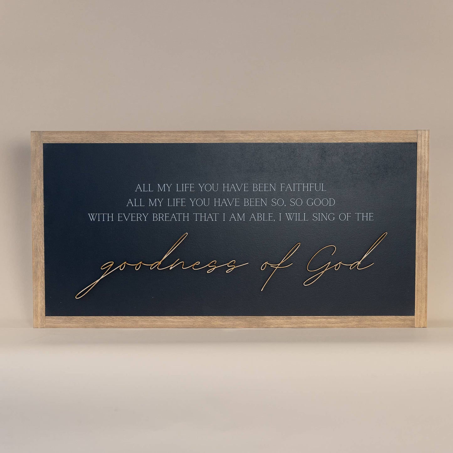 Goodness of God: Soft White-Black Text / Light Brown Frame / 45 inches by 23 inches
