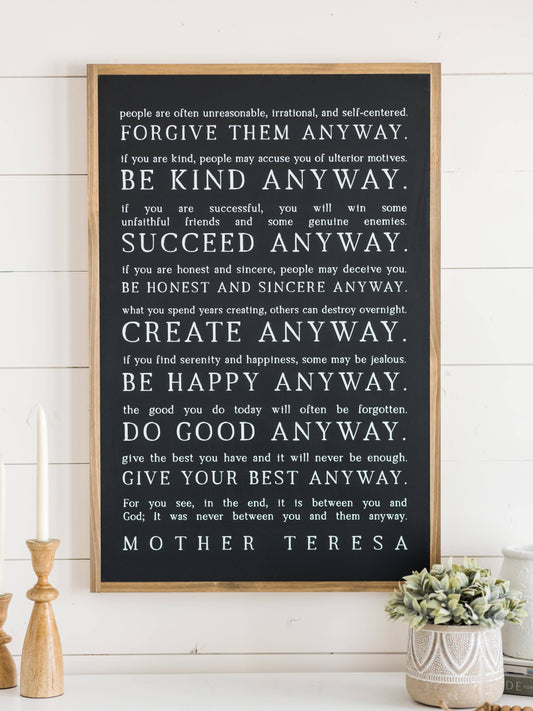 Love them Anyway | Mother Teresa | Wall Art: Black-White Text / Light Brown Frame / 16 inches x 24 inches