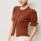 Mimosa - Puff Sleeve Ruffle Hem Knit Cardigan: Ivory / L