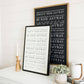 Love them Anyway | Mother Teresa | Wall Art: Soft White-Black Text / Light Brown Frame / 16 inches x 24 inches