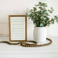 Love them Anyway | Mother Teresa | Wall Art: Soft White-Black Text / Light Brown Frame / 16 inches x 24 inches