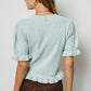 Mimosa - Puff Sleeve Ruffle Hem Knit Cardigan: Ivory / L