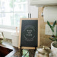 Wash the Plate | Wall Art: Black-White Text / Dark Brown Frame / 8 inches x 12 inches
